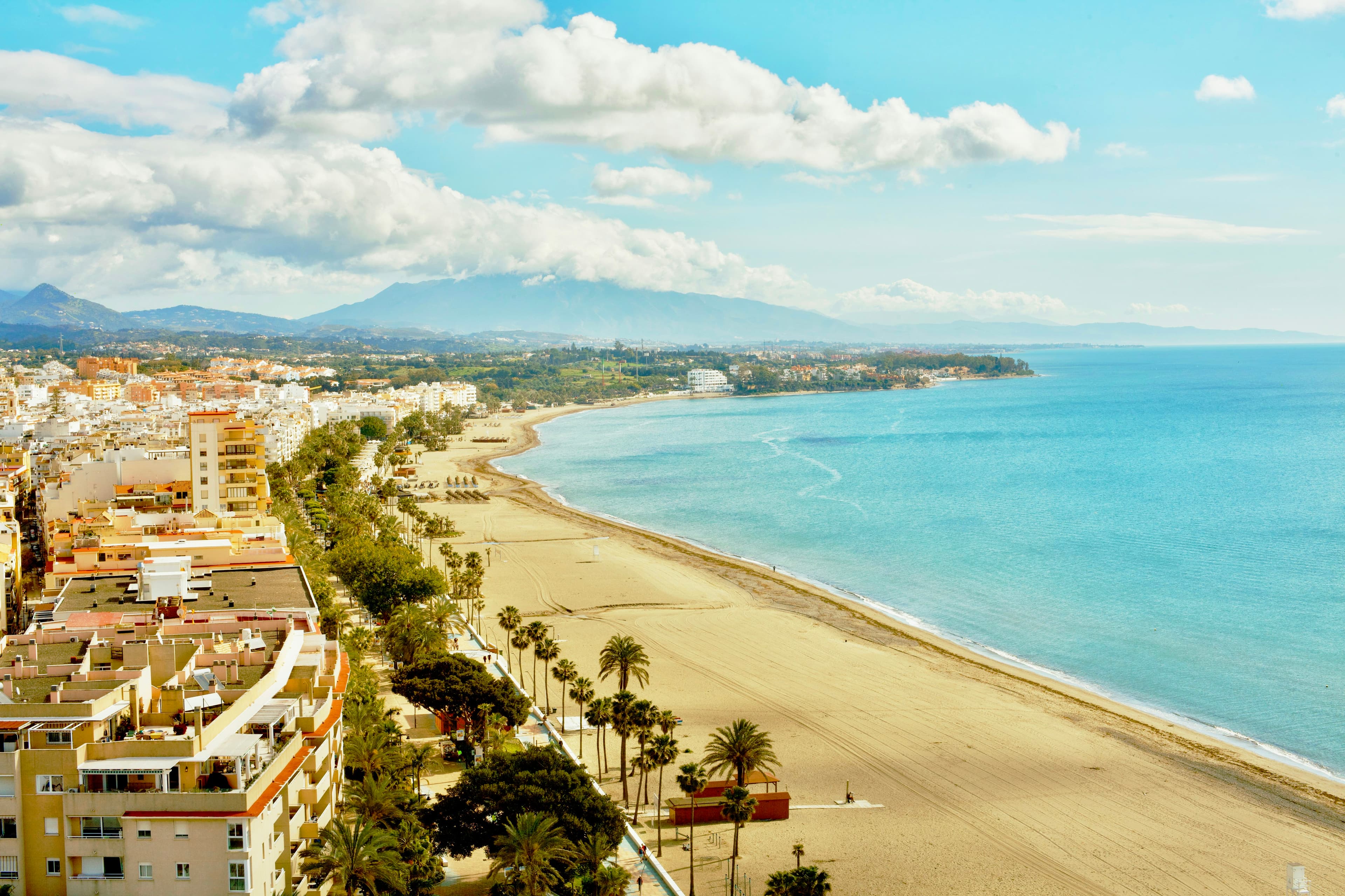 Estepona seafront and coastline seen from the beach